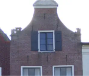 Huis met ingezwenkte halsgevel 